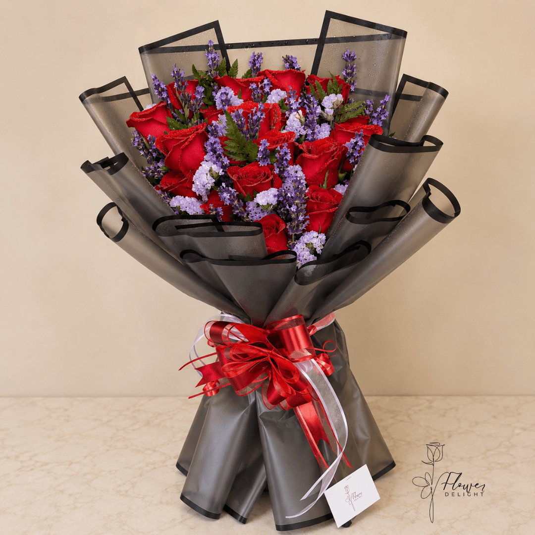 18 Red Roses and Lavender with Clear Black Wrapping by Flower Delight