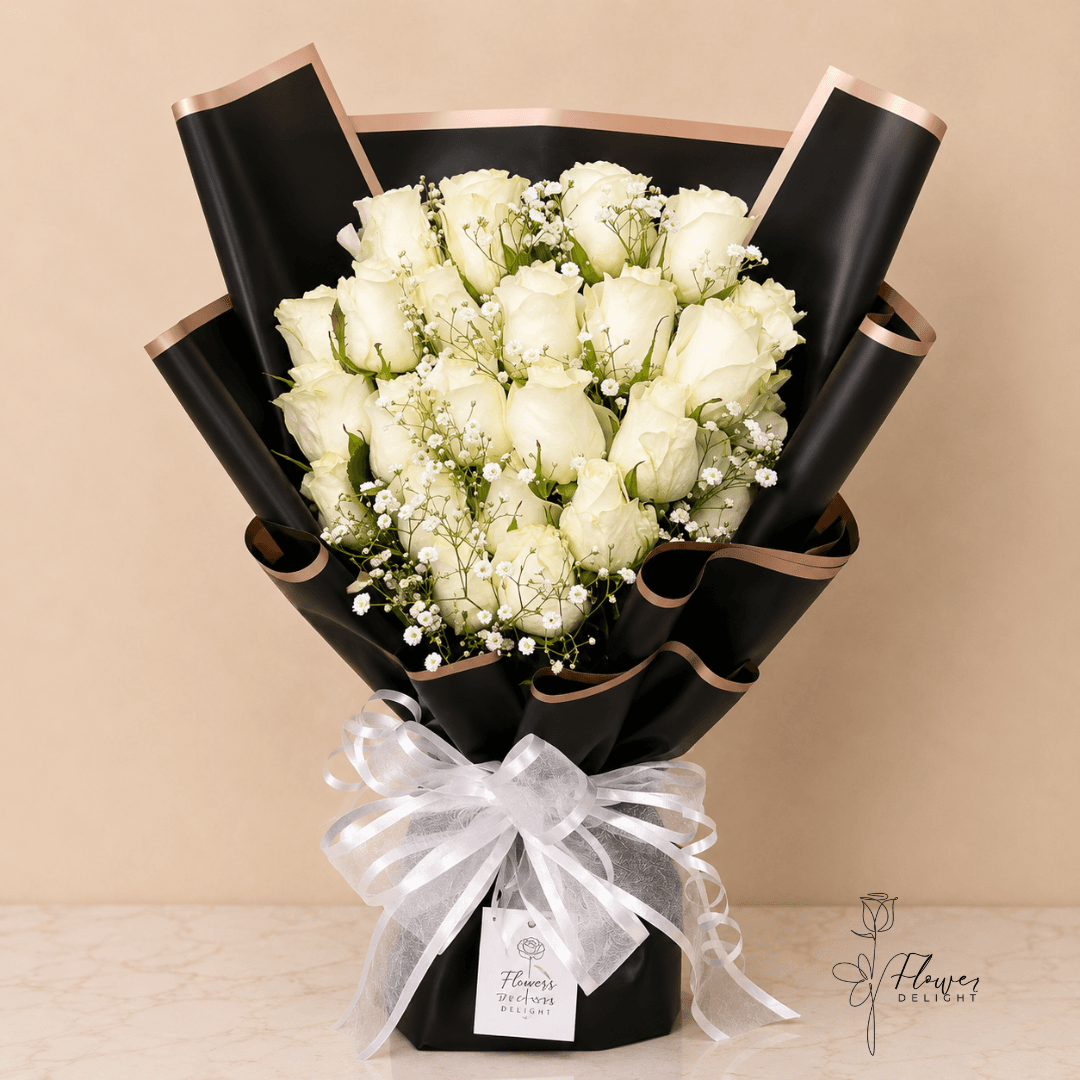 18 White Roses with Black Wrapping by Flower Delight