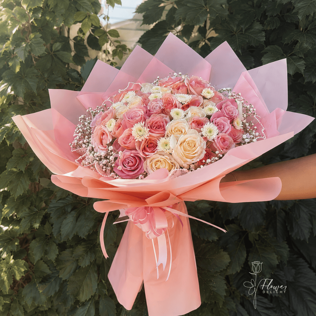 24 Pink and White Roses with Pink Wrapping by Flower Delight