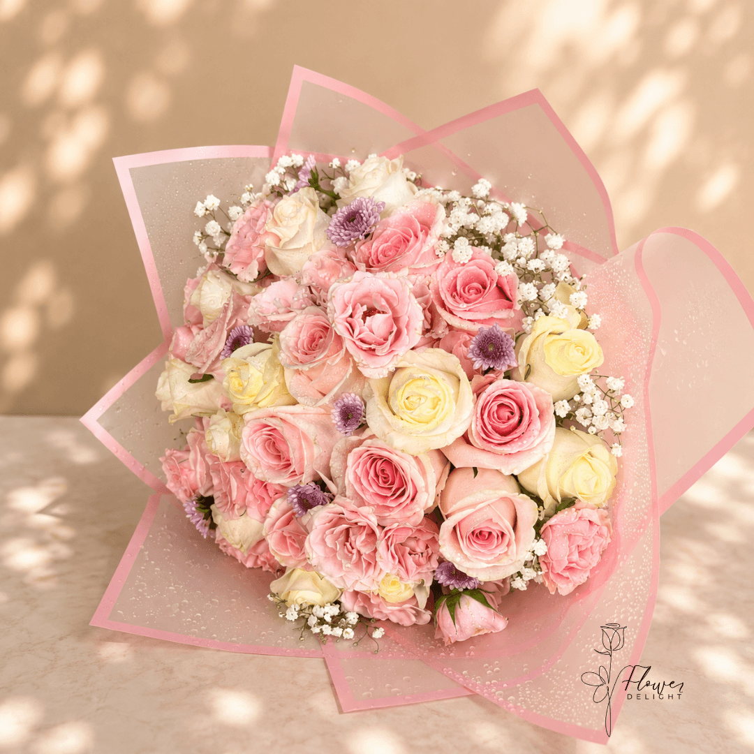 24 Pink and White Roses with Clear Pink Wrapping by Flower Delight