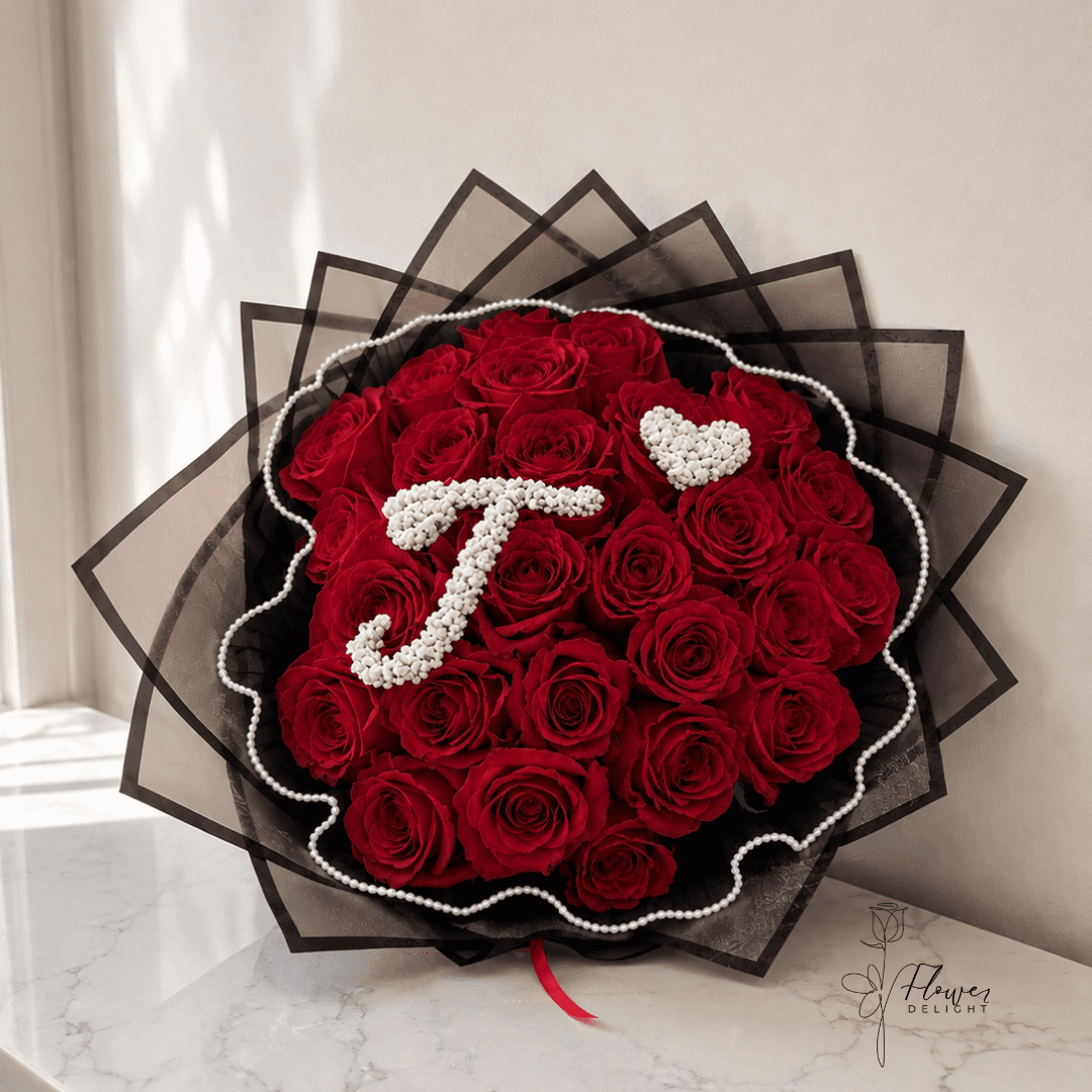 24 Red Roses with Clear Black Wrapping by Flower Delight