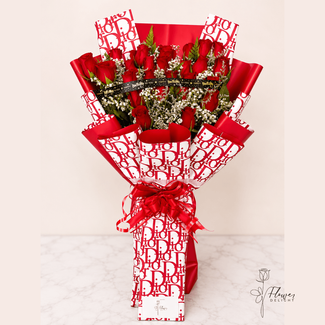 24 Red Roses with Red Dior Wrapping by Flower Delight