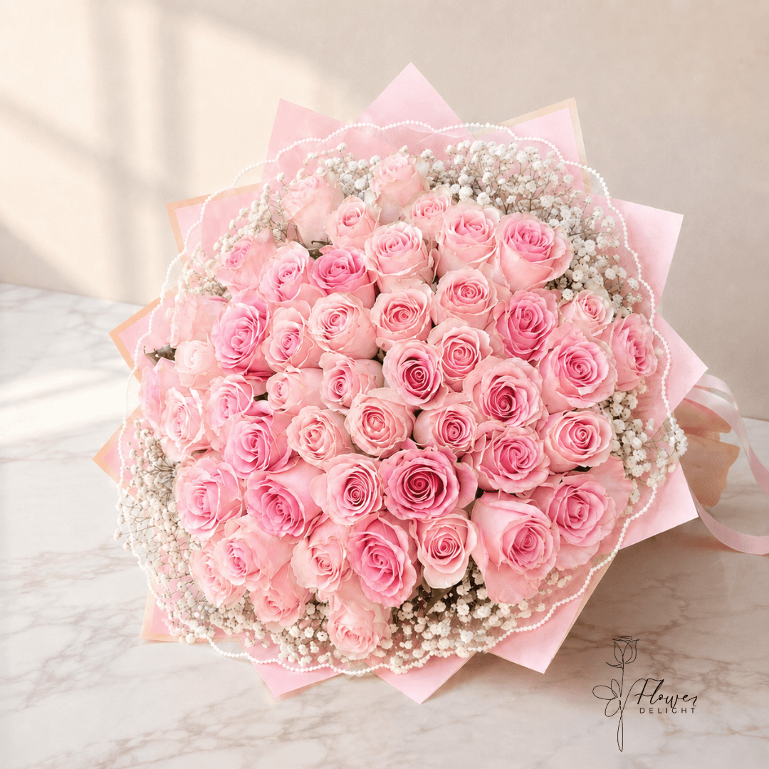 50 Pink Roses with Pink Wrapping by Flower Delight