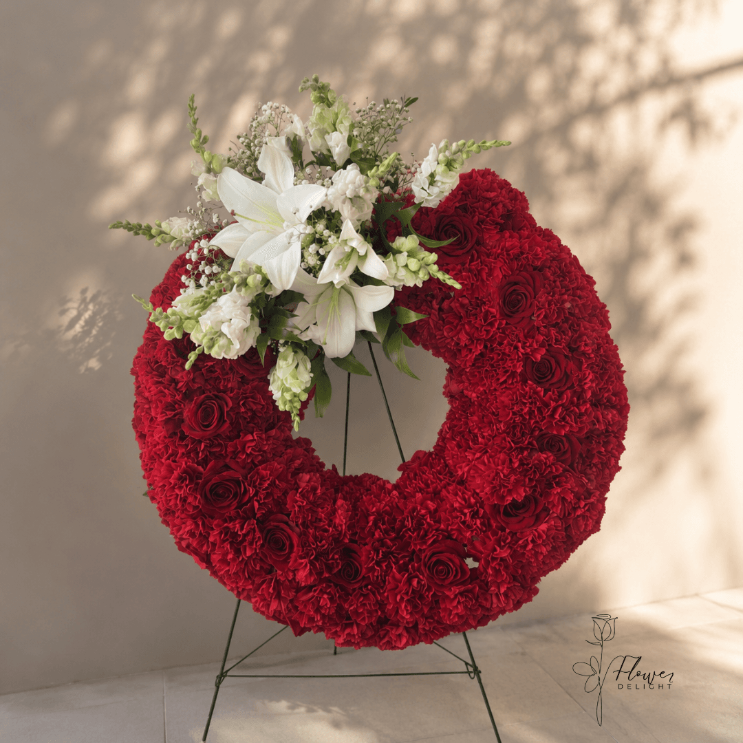 Red Funeral Arrangement by Flower Delight